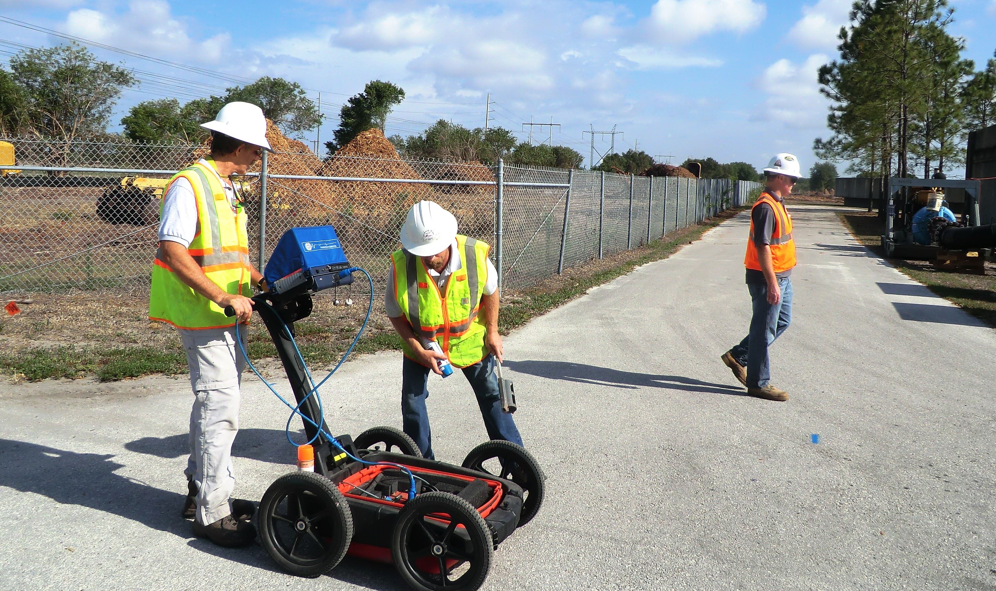 GeoView team demonstrating ground-penetrating radar at a field site